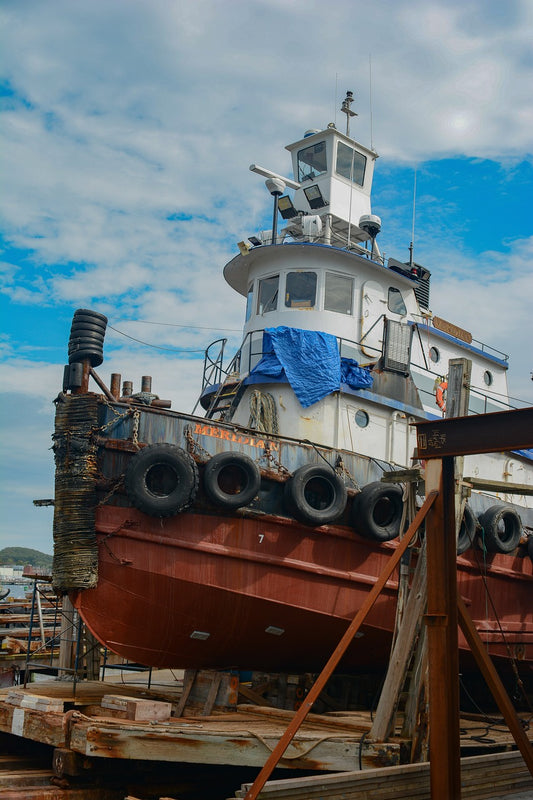 Fishing boat on blocks. Image by William Hayes from Pixabay