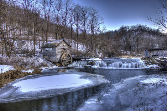 old mill on frozen river. Image by Yinan Chen from Pixabay