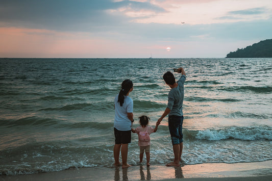 Family taking selfie on evening beach. Image by Peggy und Marco Lachmann-Anke from Pixabay