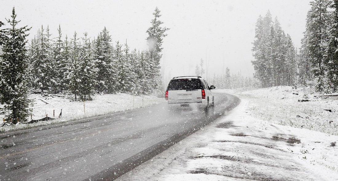 SUV on snowy road. Image by Pexels from Pixabay